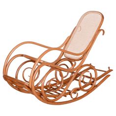 a wooden rocking chair with wicker seat and armrests on an isolated white background