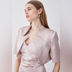 Brand New! Crafted From Sumptuous Italian Satin For An Elevated Feel, This Cropped Jacket Provides A Sophisticated Finishing Touch To Any Occasion Ensemble. A Notch Neck Adds Sharp Proportions, While A Cropped Cut Gives A Contemporary Touch. Style This Piece With The Two Piece Setinating Satin Pencil Dress For A Truly Elegant Look. Cropped Cut Notch Neck Satin Material Flat Lay Measurements- Length: 14.5in. Bin R Cover Up Jacket, Satin Tops, Winter Pea Coat, Leather Coat Womens, Cropped Coat, White Jean Jacket, Cropped Blazer Jacket, Neck Cover, Bridal Jacket