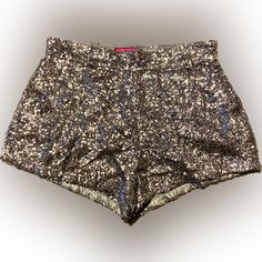 Live Up To Your High Standards In This Flashy, Silver Color Pocketless Sequin Shorts! They Feature A High Waist, Side Zipper Closure With A Relaxed Fit. Shorts Include A Full Lining. Materials & Care: 100% Polyester Hand Wash Cold. Hang Dry. Measurements: (Approximate) Approx. 2 1/2” Inseam & 11” Side Seam Trendy Party Bottoms With Short Inseam, Casual Party Bottoms With Short Inseam, Casual Bottoms With Short Inseam For Party, Lycra Shorts, Sparkle Shorts, Silver Shorts, Wrap Shorts, Black High Waisted Shorts, Sequin Shorts