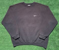 Vintage 90's Nike Swoosh White Tag Black Sweatshirt Men's XL USA Made Measurements: 48 Inch Chest 25Inches Top to Bottom  ( Tag Reads Size Large, Measures Closer to a Size XL) Condition is Pre-owned. Sun fading, fabric ware, and lite piling throughout. Please see photos above for reference. Amazing Vintage Nike Sweatshirt. Ships same or next day. Thanks for looking! Bin O8 Sweat Noir, Nike Crewneck Sweatshirt, Vintage Nike Sweatshirt, Nike Crewneck, 90s Nike, Nike Sweatshirt, Nike Vintage, Black Crewneck, Nike Sweatshirts