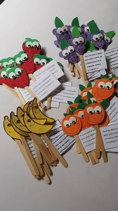 fruit and veggies on toothpicks with words