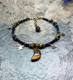 Celestial moon and star crystal anklet with tigers eye and extender ✨ Knitting Moodboard, Crystal Bracelet Ideas, Tigers Eye Crystal, Anklet Gold, Grunge Accessories, Star Crystal, Crystal Anklet, Tiger Eye Jewelry, Crystal Moon