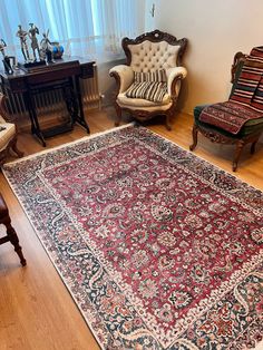 a living room filled with furniture and rugs