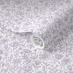 a white and purple wallpaper with flowers on it