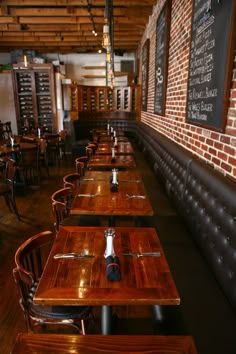 tables and chairs are lined up against the wall