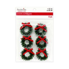 three christmas wreaths with red bows on them in packaged package for $ 5 99