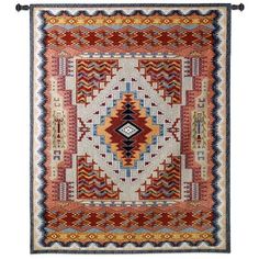 a rug with an intricate design on the front and back side, in multicolored colors