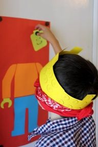 a young child is painting on the wall