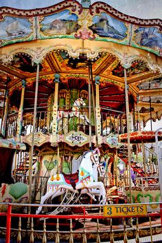 an old fashioned merry go round with horses