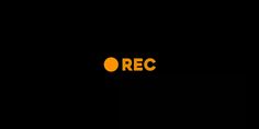 an orange rec logo on a black background with the words rec in yellow and white