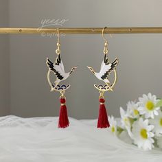 Crane with Red Tassel Earrings Dangle, Japanese Crane Earrings, Oriental Red Earrings, unique earrings Dangle 🤍 Hypoallergenic 🌸 Handmade with love ✨ Cute & Dainty  🎁 Gift ready 〰️Click👇🏻 Find more Earrings🎀  https://www.etsy.com/shop/byYeeSo ◽️ PACKAGING ◽️  * The jewelry will be nicely packaged * Comes with a drawstring suede pouch * If you need personalized gift note, please click the link below, add it to your cart when check out to upgrade your packaging. https://www.etsy.com/listing/1008661207/upgrade-gift-packaging?ref=shop_home_active_1&frs=1 ◽️ SHIPPING ◽️ * USPS First Class Shipping Service with tracking number * All products will be shipped from USA ◽️ CARE INSTRUCTIONS ◽️ * Avoid perfumes or sprays * Avoid getting your jewelry wet * Wipe down the jewelry to remove oils an Red Chandelier Earrings As Gift, Red Drop Clip-on Earrings As Gift, Red Drop Clip-on Earrings For Gift, Traditional Tassel Earrings As Gift, Red Dangle Tassel Earrings As Gift, Red Dangle Tassel Earrings For Gift, Red Dangle Earrings For Pierced Ears, Elegant Red Tassel Earrings As Gift, Elegant Red Tassel Drop Earrings