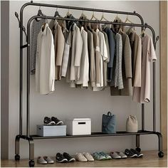 a rack with shoes and clothes hanging on it