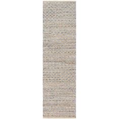 the runner rug is made from light blue and beige tones, with small squares on it