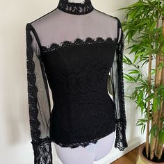 Gorgeous Black Lace Top By Jscollections. Shear On Arms Neck And Dcollet . Zippered Back Then Fabric Buttons Up The Back Size 6 Never Worn. Brand New Form Fitting. Sheer Black Lace Top For Evening, Black Sheer Lace Top For Evening, Black Fitted Long Sleeve Lace Top, Fitted Black Lace Top With Long Sleeves, Fitted Black Lace Top For Fall, Sheer Black Lace Top For Party, Fitted Black Lace Blouse, Fitted Black Lace Top For Evening, Fitted Black Lace Top For Formal Occasions