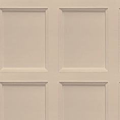 a white door with four square paneled panels