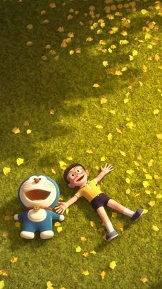 a cartoon character laying on the ground next to another character with their arms out in front of them