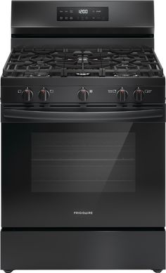 a black stove top oven with the door open