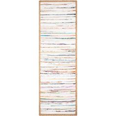 a white rug with multicolored stripes on the bottom and bottom, in front of a