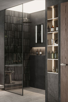 a bathroom with a glass shower door and shelves