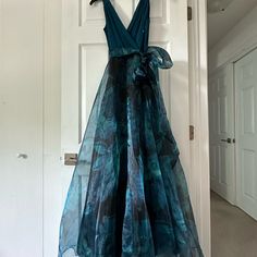 This Beautiful Teal Evening Dress About Size 7/8. It’s A European Size 2. The Breast Area Can Expand Up To 36c Breast Size. The Length Can Go From Maxi To Midi Depending On The Persons Height. Elegant And Feminine, Flows With 4 Layers Of Material Under To Create Cinderella Taffeta Look. Waist 26” Max. Brand New, Never Worn. Retails $248. Dark Teal Wedding Dress, Teal Wedding Dress, Teal Formal Dress, Dark Teal Weddings, Blue Sheer Dress, Von Maur, Teal Wedding, Size 8 Dress, Prom Dresses Long