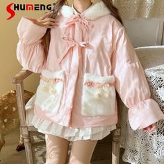 Step into the world of kawaii fashion with our Sweet Lolita Winter Coat. This enchanting coat is the epitome of kawaii charm, featuring a delightful pastel hue, whimsical white accents, and adorable pink bows that will make you feel like a living doll. Key Features: Pastel Perfection: Embrace the soft and soothing pastel palette with this sweet winter coat. The lovely pastel shade is complemented by pure white details, creating a dreamy and kawaii aesthetic. Cozy Warmth: Designed for the chilly Kawaii, Adorable Outfits Pastel, Kawaii Winter Coat, Kawaii Winter Clothes, Kawaii Kei Outfit, Susie Core, Doll Aesthetic Outfits, Kawaii Winter Outfits, Pastel Kawaii Outfits