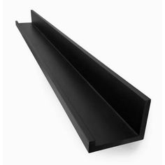 the black plastic shelf is shown against a white background