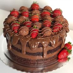 a chocolate cake with strawberries on top