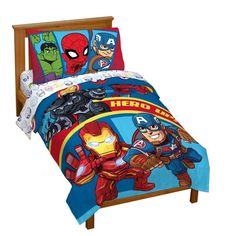 a bed with avengers and iron man bedspreads