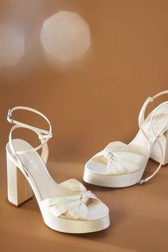 Bella Belle Platform Heels | Anthropologie Chic Wedding Block Heels With Stacked Heel, Chic Wedding Block Heels With Padded Heel, Chic Wedding Block Heels With Sculpted Heel, Chic Wedding Block Heels With Wrapped Heel, Chic Block Heels With Wrapped Heel For Wedding, Elegant Synthetic Block Heels, Chic Block Heel Wedding Heels, Chic Wedding Shoes With Wrapped Heel, Elegant Closed Toe Synthetic Block Heels