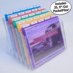 a stack of five clear plastic folders with colored labels on the front and back