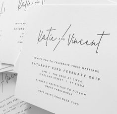 the wedding stationery is laid out on top of each other and ready to be printed