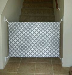 a stair case with white and grey tile on it