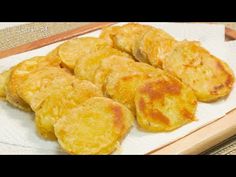 some fried food is on a white plate