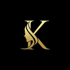 the letter k with a woman's face on it in gold foil, against a black background