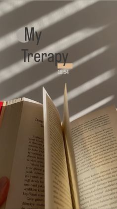 an open book with the title my therapy