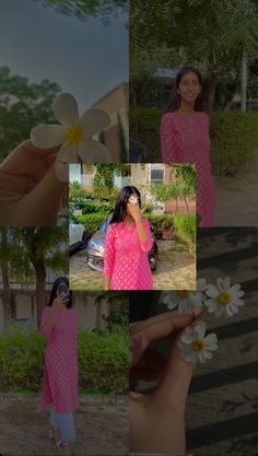 a woman in a pink dress standing next to a hand holding a flower and taking a photo with her cell phone