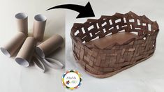 an image of a basket made out of toilet paper rolls and rolled up with scissors