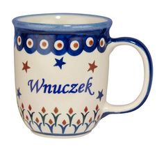 a blue and white coffee mug with the word wnuzekk written on it