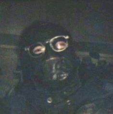 a man wearing a gas mask and goggles