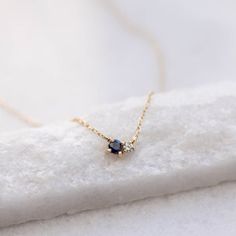 Blue Sapphire Diamond necklace in 14K solid yellow gold in cluster set. A minimal necklace for women with natural gemstones. A great gift for her. D E T A I L S● Metal: 14K solid gold, 14K white gold or 14K rose gold● Gemstones: Sapphire, round cut 3mm, Diamond, brilliant cut, 2mm● Gemstones Weight: Sapphire 0.10 ct, Diamond 0.03 ct● Length: 40 cm - 16 inchesH O W ∙ T O ∙ O R D E RChoose from the drop-down menu the available options (Metal) and leave us a note for any special requirements.G I F Sapphire Necklace Simple, Danty Necklace, Sapphire Diamond Necklace, Sapphire Diamond Pendant, Gold Amethyst Ring, Sapphire Necklace Pendants, Blue Sapphire Pendant, Blue Sapphire Necklace, Natural Gemstone Necklace