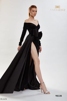 Indulge in the enchanting allure of the Tarik Ediz 98338 Velvet Fall 2023 evening collection dress. 🌙✨ Crafted with meticulous attention to detail, this exquisite masterpiece is designed to captivate hearts and ignite passion. 🌹💃🏻 With its luxurious velvet fabric and graceful silhouette, this dress exudes timeless elegance and sophistication. Perfect for special occasions and formal events, it effortlessly combines tradition with modernity, making you the epitome of grace and style. 💫🌟 Emb Luxury Ball Gown Evening Dress With Sweep Train, Evening Dress Ball Gown With Detachable Train, Fitted Couture Ball Gown For Evening, Evening Ball Gown With Detachable Train, Elegant Ball Gown With Sweetheart Neckline For Evening, Couture Fitted Ball Gown For Evening, Luxury Evening Ball Gown For Gala, Formal Gown With Detachable Train For Gala, Couture Ball Gown Evening Dress For Gala