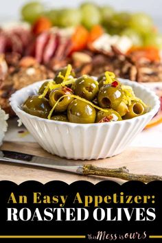 an easy appetizer roasted olives in a white bowl