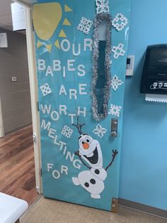 a door decorated to look like a frozen princess with the words your babies are worth melting for