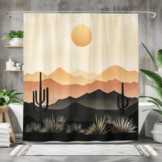 a shower curtain with a desert scene in the background