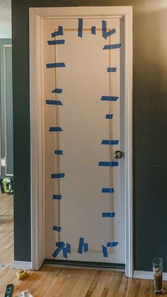 a door with blue tape taped to it