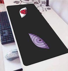 a computer mouse pad sitting on top of a desk