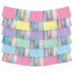 multicolored paper streamers on white background