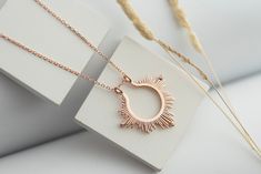 🎉 The Perfect Solution for Women Who Wear Rings: Keep Your Rings Safe and Stylish!  Rings are not only elegant accessories but also carry precious memories. However, there are certain situations where you might need to remove your rings. In these moments, our Ring Holder Necklace offers the perfect solution to keep your rings safe and stylish. Ring Holder Necklace Gold Wife Gift When Should You Remove Your Rings? 💖 Sports and Exercise: Rings can get damaged or irritate your skin during physical activities. Prevents your ring from getting scratched or lost during weightlifting, yoga, or running. 💖 Cleaning and Household Chores: Chemicals used in cleaning can tarnish your rings. Reduces the risk of losing or damaging your ring while washing dishes or cooking. 💖 Swimming and Showering: Ch Ring Holding Necklace, Ring Keeper Necklace, Ring Necklace Holder, Wear Rings, Sun Jewelry, Eyeglasses Holder, Ring Holder Necklace, Necklace Sun, Her Ring