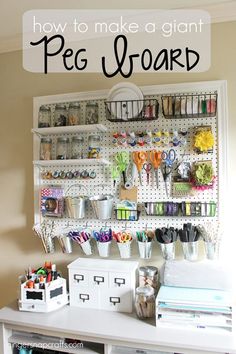 an organized peg board with craft supplies on it