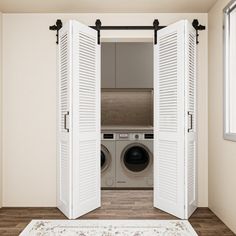 an open door leading to a washer and dryer in a room with wood floors